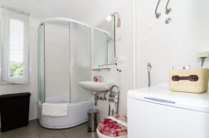 Kúpeľňa v ubytovaní Apartments by the sea Dubrovnik - 8544