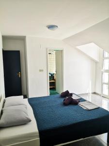 Posteľ alebo postele v izbe v ubytovaní Apartments and rooms by the sea Slano, Dubrovnik - 8737