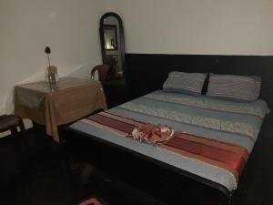 Postel nebo postele na pokoji v ubytování Paradise inn