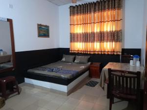 Postel nebo postele na pokoji v ubytování Paradise inn