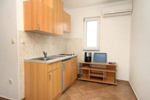 Η κουζίνα ή μικρή κουζίνα στο Apartments with a parking space Stari Grad, Hvar - 8762 +16 φωτογραφίες