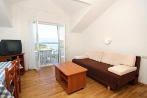 Fotografia z galérie ubytovania Apartments with a parking space Jelsa, Hvar - 8765 v destinácii Jelsa