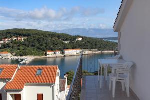 Fotografia z galérie ubytovania Apartments with a parking space Jelsa, Hvar - 8765 v destinácii Jelsa