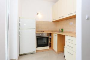 Fotografia z galérie ubytovania Apartments with a parking space Omis - 10351 v Omise