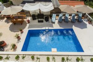 Fotografia z galérie ubytovania Seaside apartments with a swimming pool Rastici, Ciovo - 11092 v Trogiri + 21 fotografií