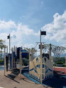 a playground with a slide in a park at IMPERIUM RESIDENCE KUANTAN [Seaview] Family Suite in Kuantan