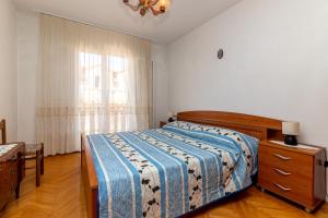 Posteľ alebo postele v izbe v ubytovaní Apartments with parking spaces Supetar, Brac - 11278