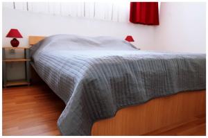 Posteľ alebo postele v izbe v ubytovaní Apartment Razanj 11347c