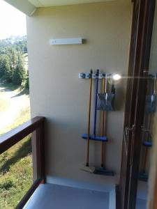 a room with a door with a view of a field at Appartement Edelweiss Chamrousse vue sur Recoin La Croix de Chamrousse Grenoble in Chamrousse