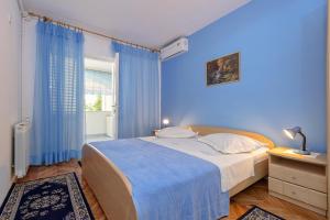 เตียงในห้องที่ Apartments with a parking space Stari Grad, Hvar - 8726