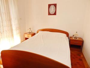 Posteľ alebo postele v izbe v ubytovaní Apartment Pag 11358e