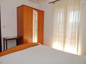 Posteľ alebo postele v izbe v ubytovaní Apartment Pag 11358e