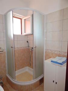 Kúpeľňa v ubytovaní Apartment Pag 11358e