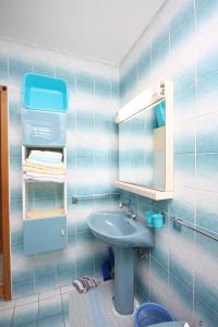 Koupelna v ubytování Apartment Lopar 10402a