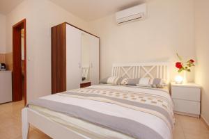 Postel nebo postele na pokoji v ubytování Apartments with a parking space Orebic, Peljesac - 10423