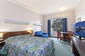 Postel nebo postele na pokoji v ubytování William Dutton Motel