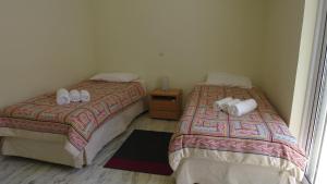 Posteľ alebo postele v izbe v ubytovaní Modern apartment near Acropolis peaceful location.