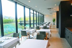 Restoran või mõni muu söögikoht majutusasutuses Hotel Vison