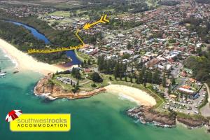 an aerial view of a beach with a yellow arrow at Cameo Court 2 in South West Rocks