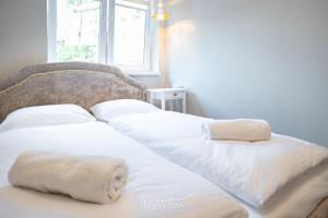 Łóżko lub łóżka w pokoju w obiekcie Apartamenty Na Szlaku, MyWeek
