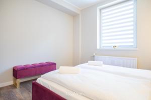 Łóżko lub łóżka w pokoju w obiekcie Apartamenty Na Szlaku, MyWeek