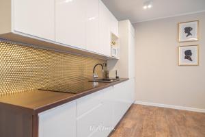 Kuchnia lub aneks kuchenny w obiekcie Apartamenty Na Szlaku, MyWeek