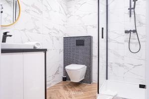 Łazienka w obiekcie Apartamenty Na Szlaku, MyWeek