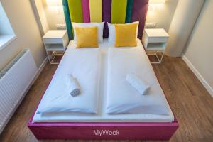 Łóżko lub łóżka w pokoju w obiekcie Apartamenty Na Szlaku, MyWeek