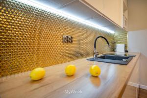 Kuchnia lub aneks kuchenny w obiekcie Apartamenty Na Szlaku, MyWeek