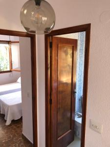 A bed or beds in a room at APARTAMENTO KORINTO