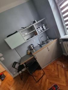 Kuchyň nebo kuchyňský kout v ubytování Apartamenty Duo