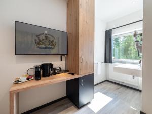 Gasthof Wisonbrona的电视和/或娱乐中心