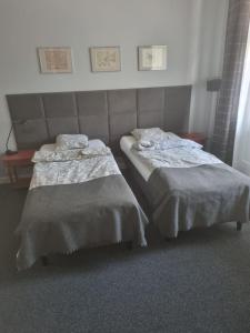 Postel nebo postele na pokoji v ubytování Apartamenty Duo