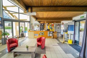 Lobby o reception area sa Village de gîtes de Blajoux