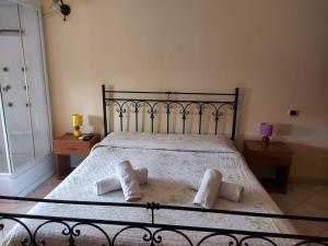 Postel nebo postele na pokoji v ubytování Affitto breve Puccio A Chiazza Realmonte