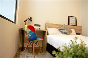Postel nebo postele na pokoji v ubytování U Hotel Penang