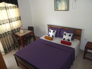 Postel nebo postele na pokoji v ubytování Paradise inn