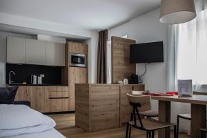 A kitchen or kitchenette at DolceAmbiez Apartments