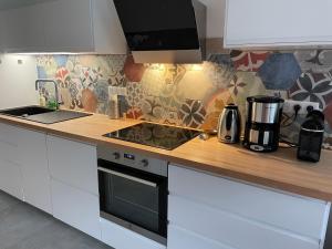 Kuchyňa alebo kuchynka v ubytovaní Chatel - appartement 3 pièces rénové - 6 personnes - proche centre - ménage inclus
