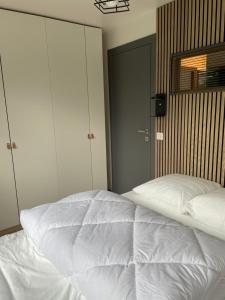 Posteľ alebo postele v izbe v ubytovaní Chatel - appartement 3 pièces rénové - 6 personnes - proche centre - ménage inclus