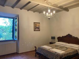 Posteľ alebo postele v izbe v ubytovaní Dimora storica nel cuore della Toscana