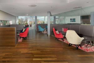Area soggiorno di Ramada by Wyndham Dresden