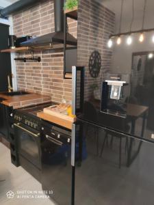 A kitchen or kitchenette at Beach and Sun - Paseo Marítimo -Playa