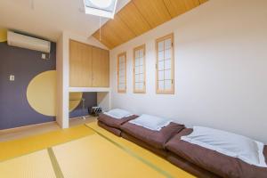 Postel nebo postele na pokoji v ubytování Nishikujo 1-16-18 - Vacation STAY 86170