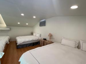 Letto o letti in una camera di Jabez II