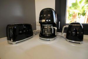 Coffee and tea making facilities at TESS Villa Le Clos Fleury