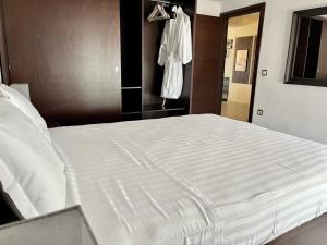 Postel nebo postele na pokoji v ubytování ZEN Apartments