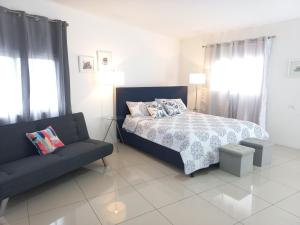 Ένα ή περισσότερα κρεβάτια σε δωμάτιο στο W's Hostel
