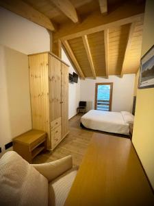 Postel nebo postele na pokoji v ubytování Orobie Holiday Apartments