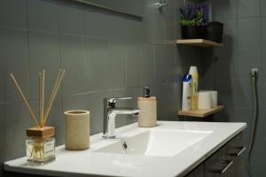 A bathroom at Arados family Residence